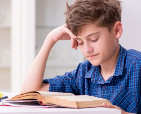 Learning disabled with ADHD kid preparing for school at home.